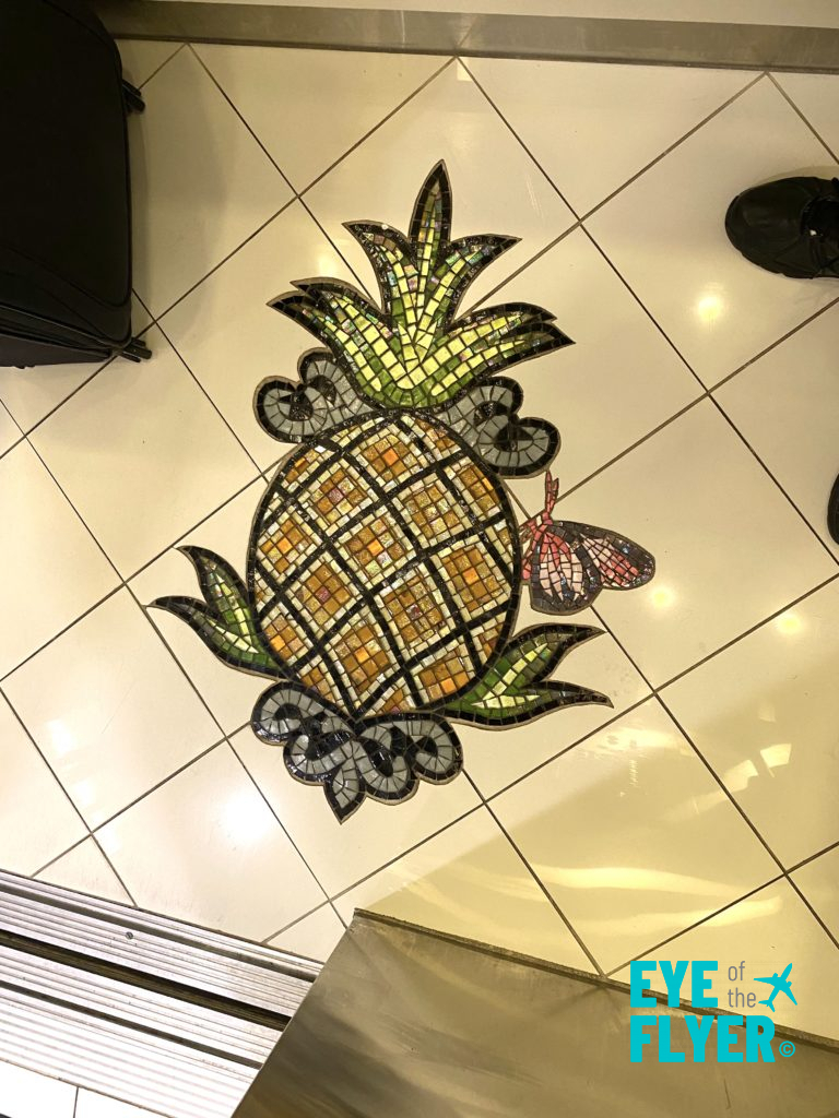 Staypineapple New York pineapple in elevator.