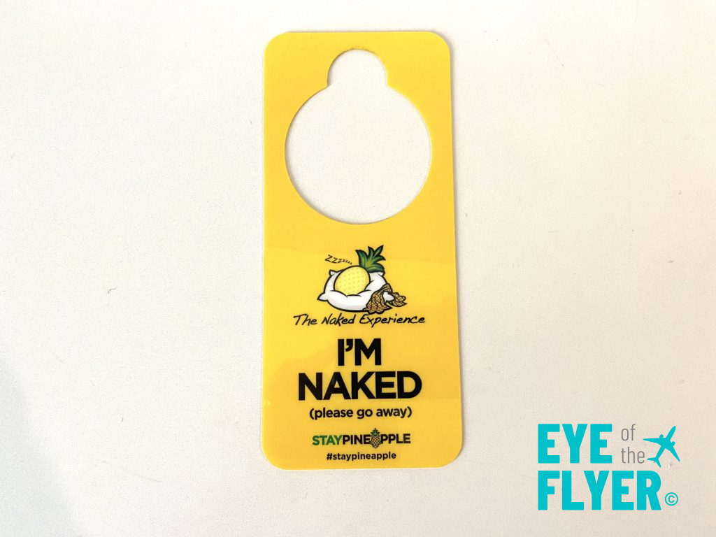 "I'm Naked" do not disturb door handle hanger at Staypineapple New York