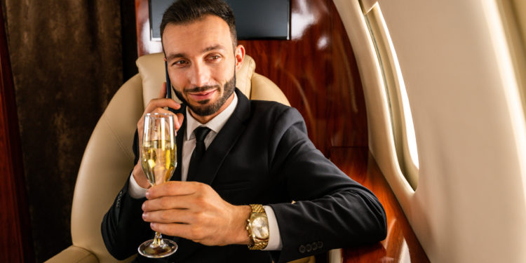 Man sitting in a first class or a private jet
