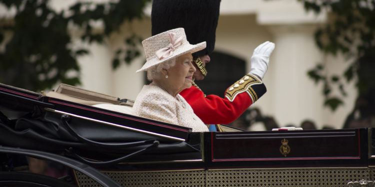 London, England - June 13, 2015: Queen Elizabeth II in an open carriage with Prince Philip for trooping the colour 2015 to mark the Queens official birthday, London, UK