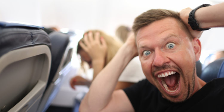 Surprised airline passenger