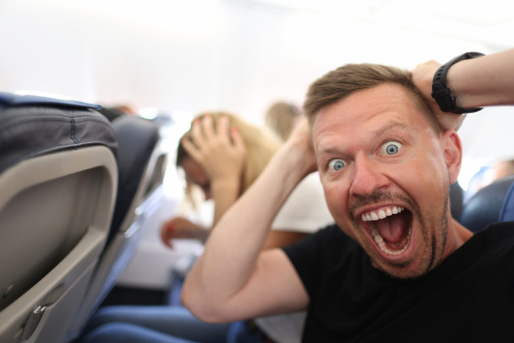 Surprised airline passenger