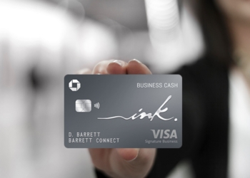 Woman holding a Ink Business Card