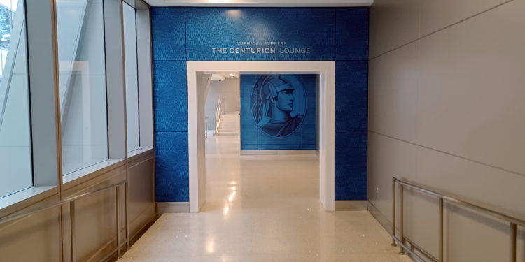 a blue wall with a picture of a man on it
