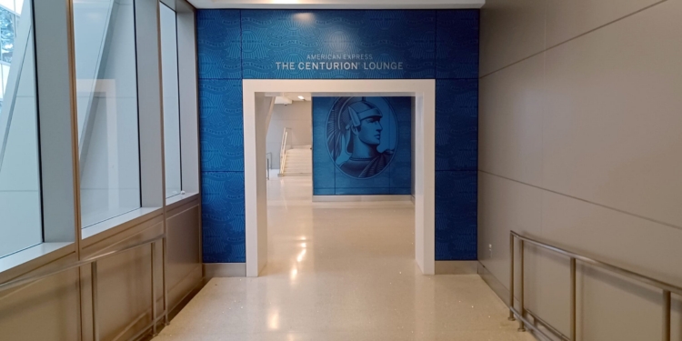 a blue wall with a picture of a man on it