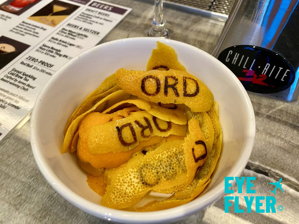 a bowl of lemon chips with writing on it