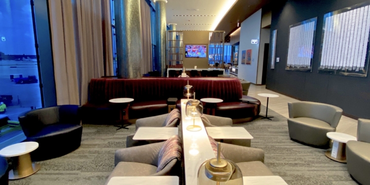 a room with couches and tables