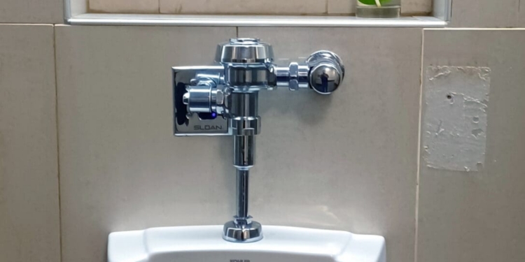 a urinal in a bathroom