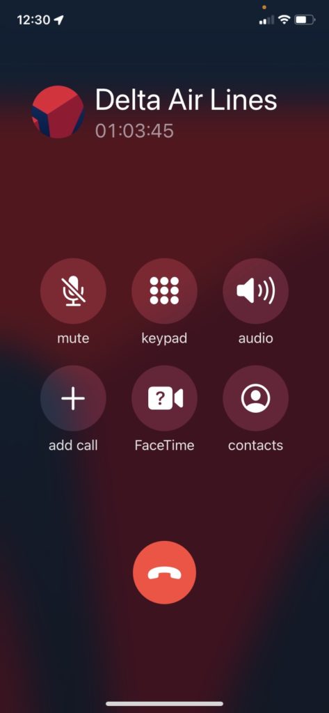 Waiting over an hour on hold with Delta Air Lines for them to reissue a ticket after applying an Upgrade Certificate.