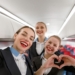 Flight attendants smiling for a selfie photo