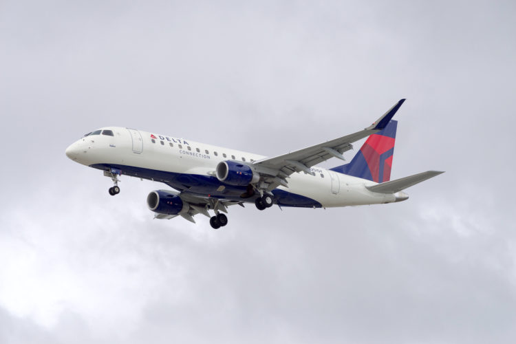 Los Angeles, California, USA - March 10, 2019: image of Delta Air Lines Connection 2016 Embraer ERJ-175LR with registration N251SY shown approaching LAX, Los Angeles International Airport.