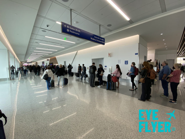 Guests wait to enter the T3 Delta Sky Club at Los Angeles International Airport (LAX)