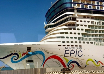 a large cruise ship with a colorful design on it