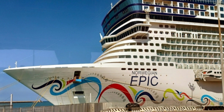a large cruise ship with a colorful design on it