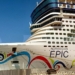 a large cruise ship with a colorful design on it