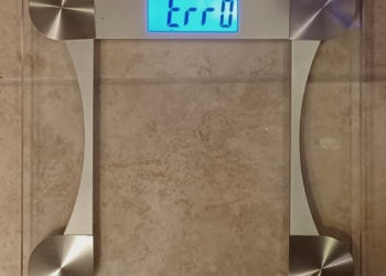 a scale with a blue screen