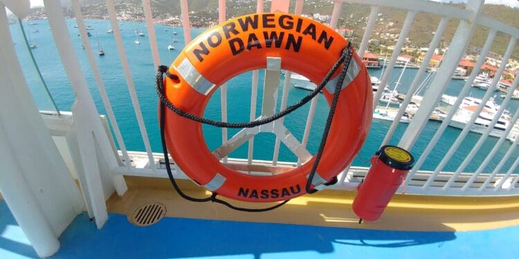 an orange life preserver on a boat