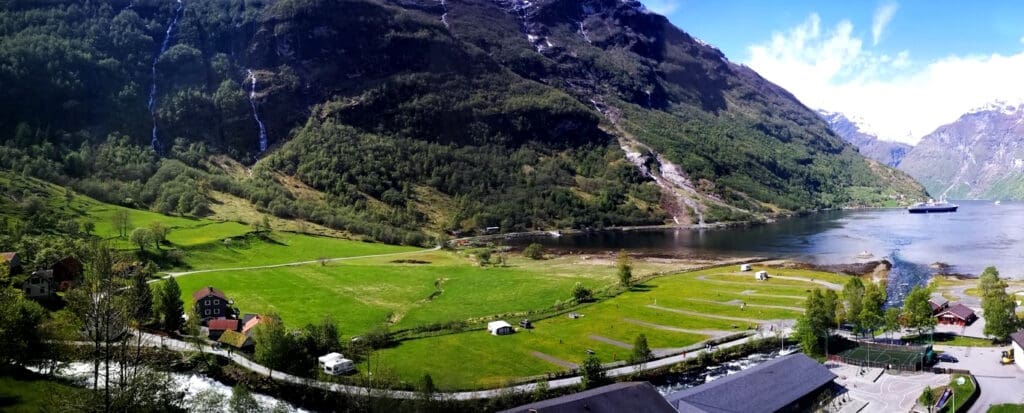 a green field near a river