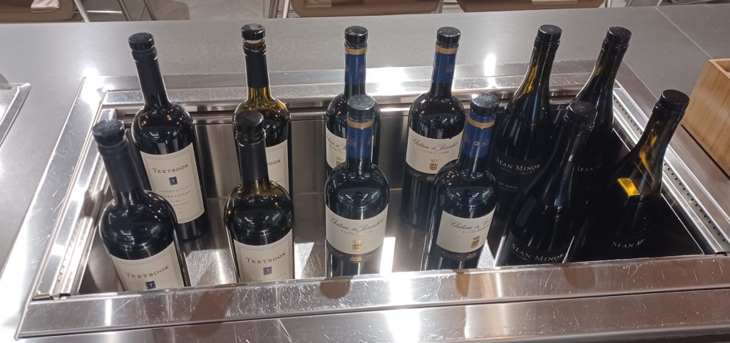 a row of bottles of wine