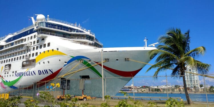 a cruise ship docked at a dock