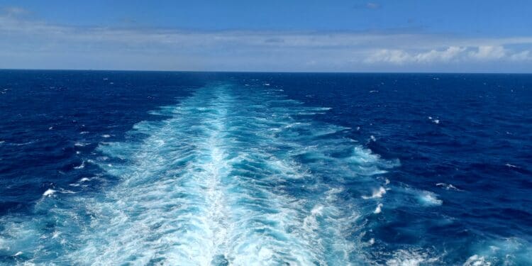 a wake of a boat in the ocean