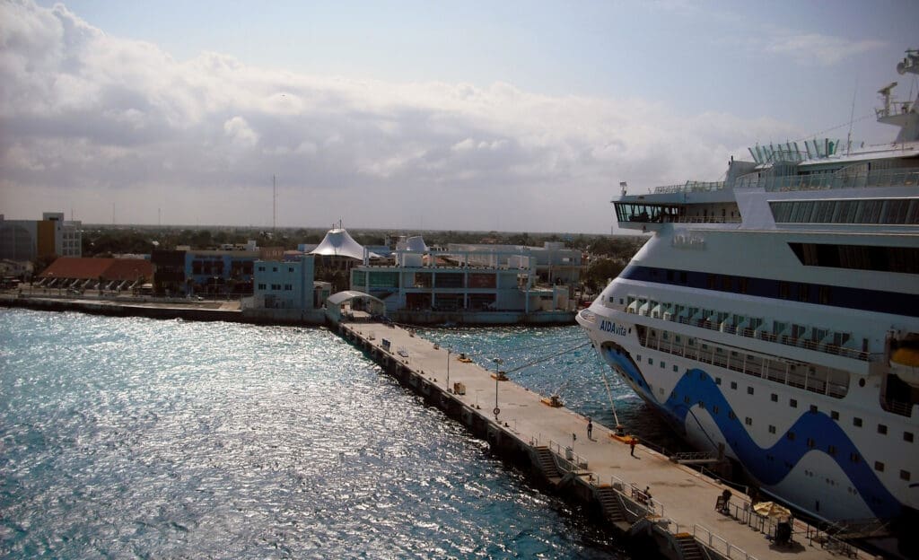 a cruise ship docked at a dock