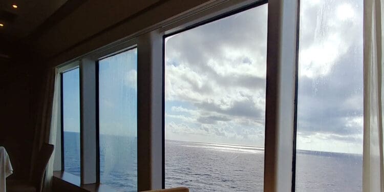 a view of the ocean from a window