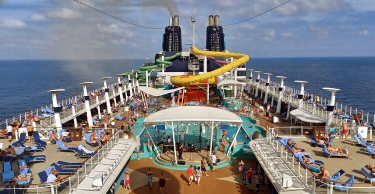 a large cruise ship with people on deck