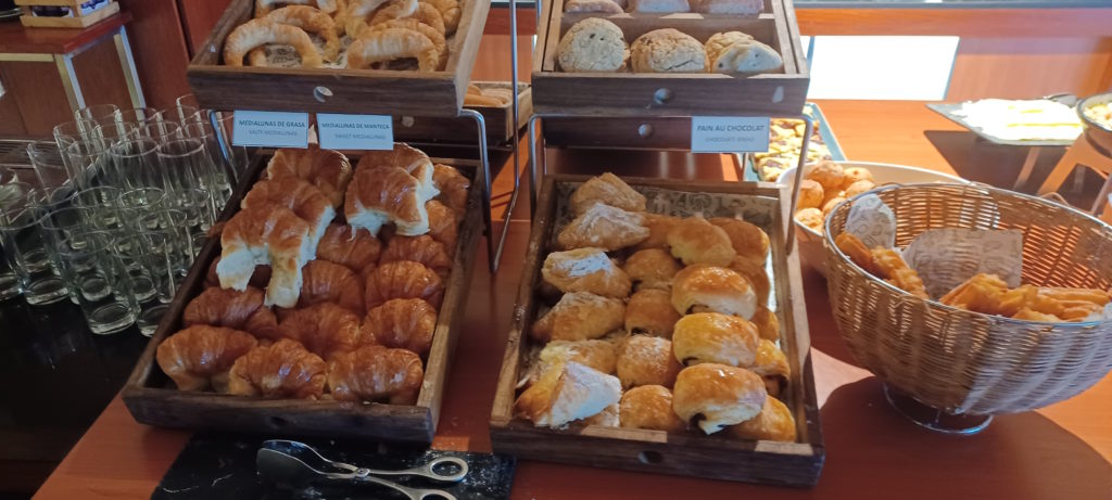 a group of wooden boxes of pastries