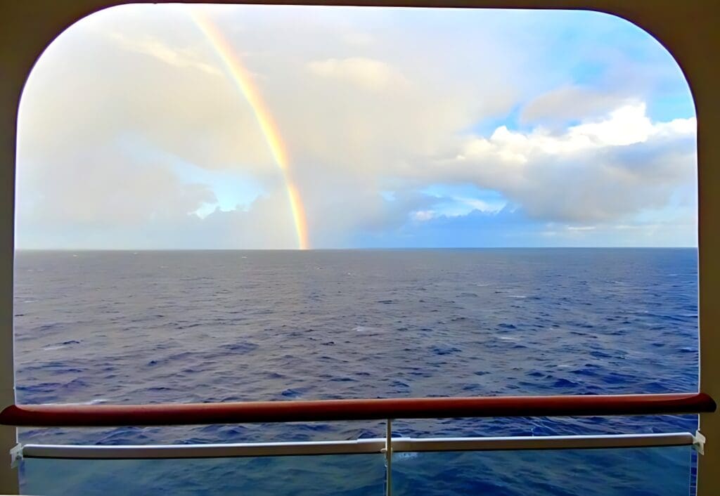 a rainbow over the ocean