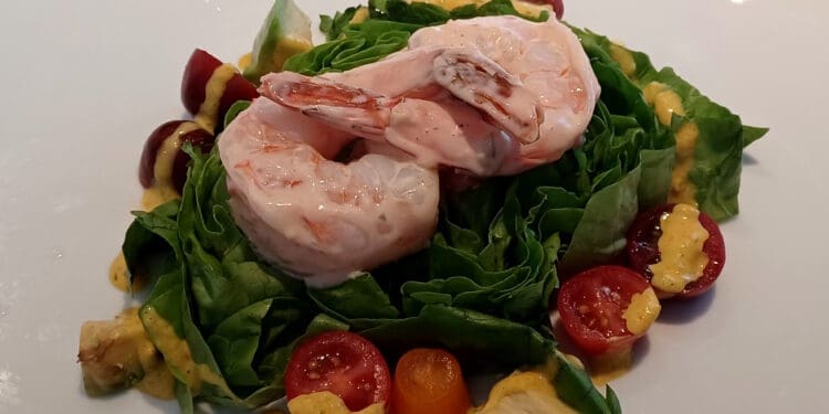 a plate of food on a white surface