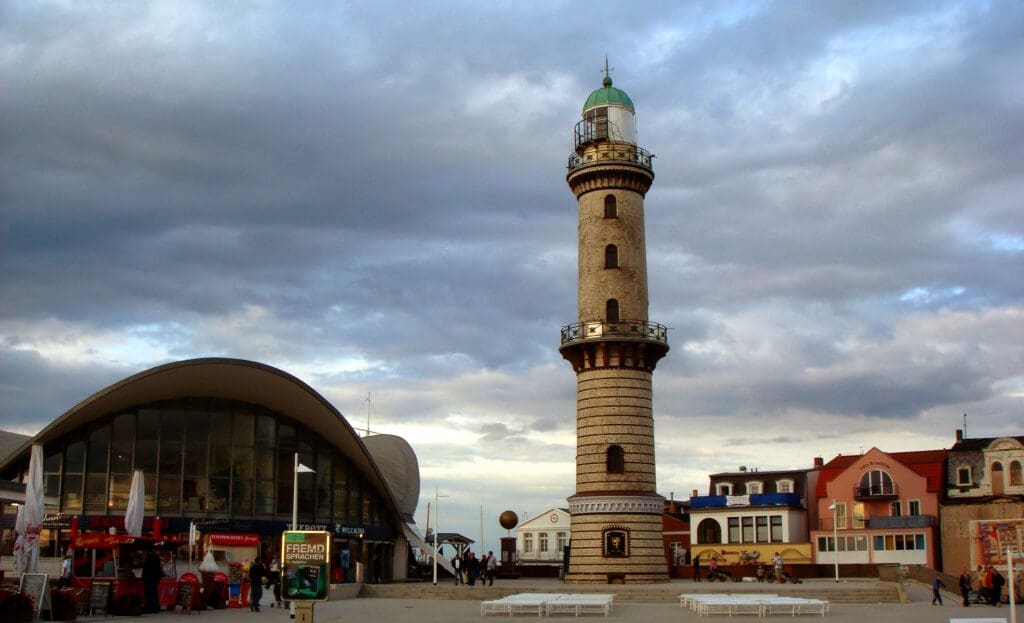 a tall tower with a green roof