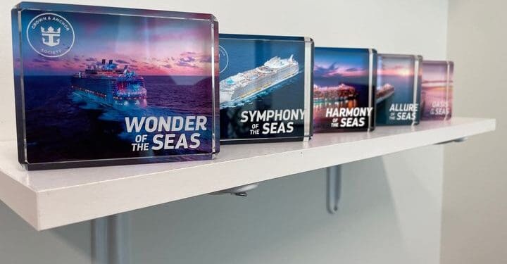 a group of pictures on a shelf