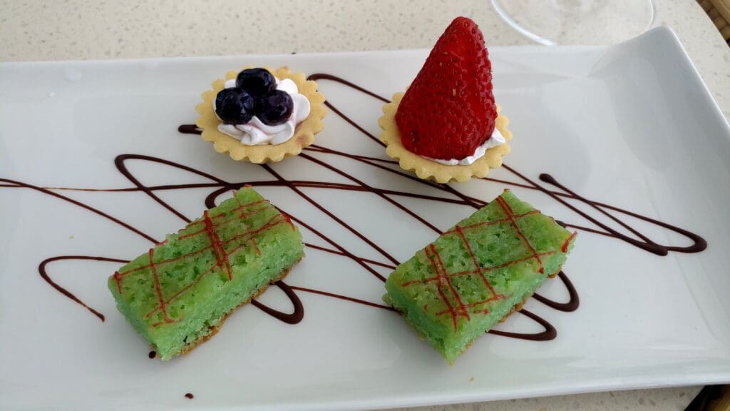 a plate of desserts on a table