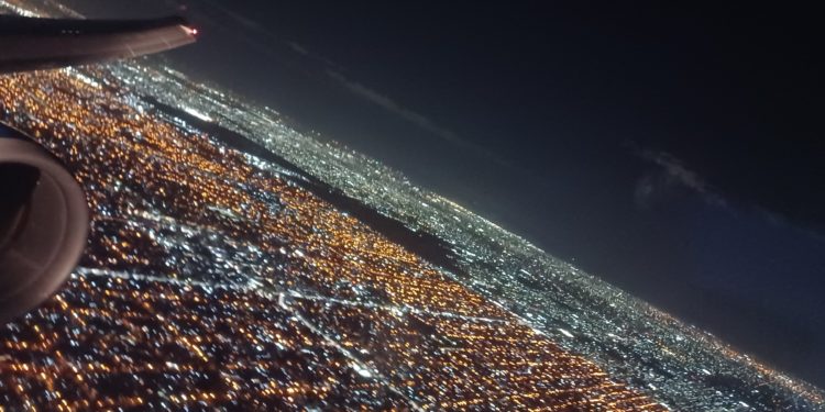 an aerial view of a city at night