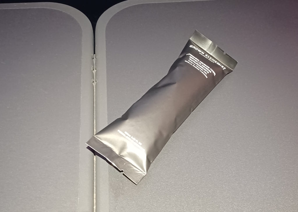 a silver package on a grey surface