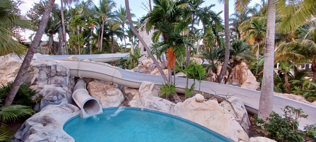 a water slide in a pool