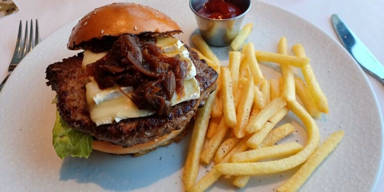 a burger and fries on a plate
