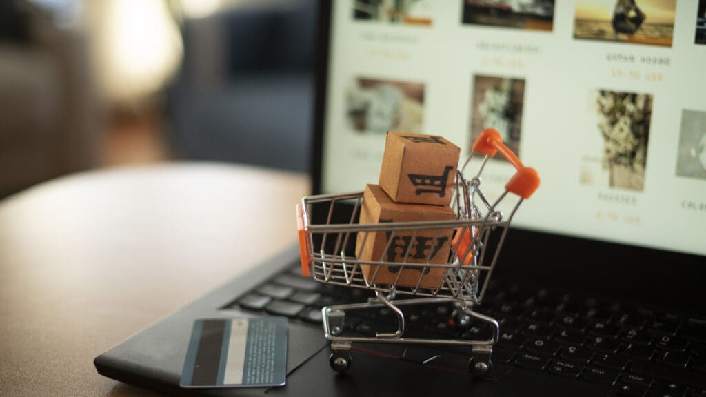 a shopping cart with boxes on it