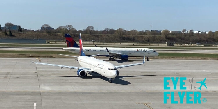 two airplanes on a runway