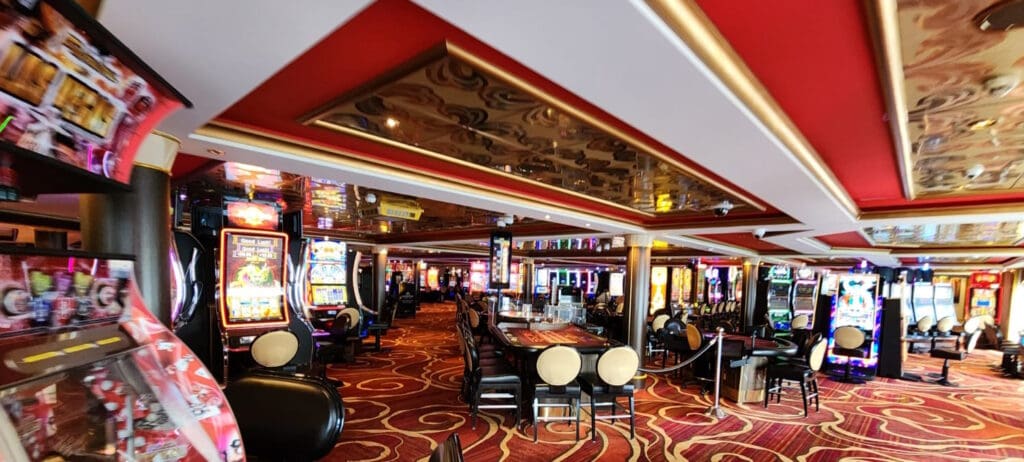 a room with a casino table and chairs