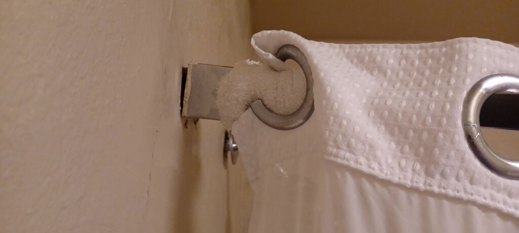a towel from a metal holder