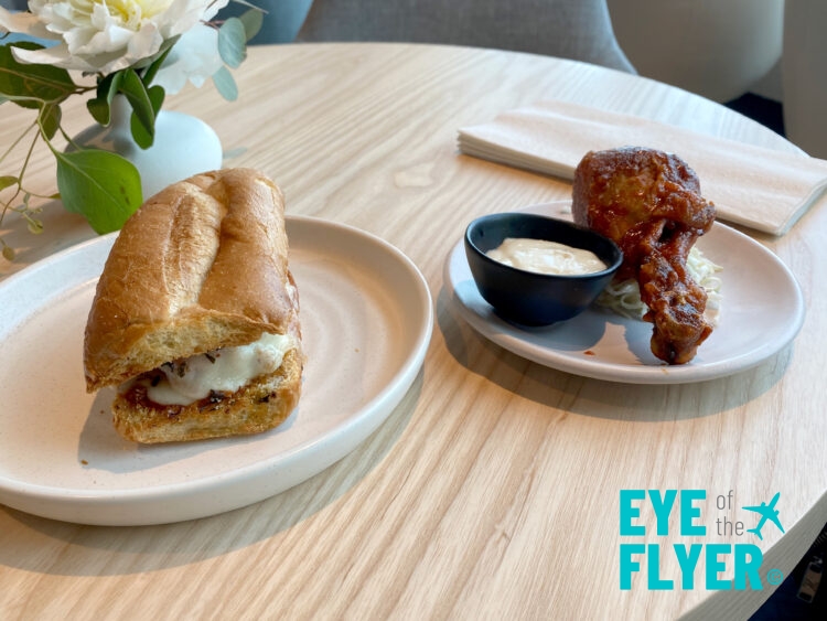 Meatball sandwich and Buffalo sticky chicken at the Boston Chase Sapphire Lounge by The Club