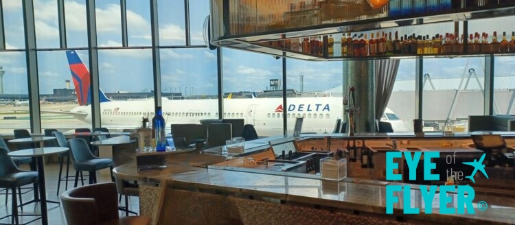 a bar with a plane in the background