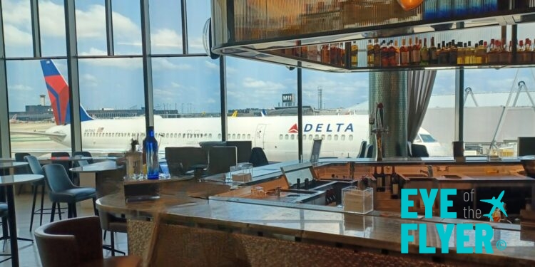 a bar with a plane in the background