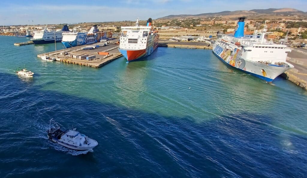 a group of ships in a harbor