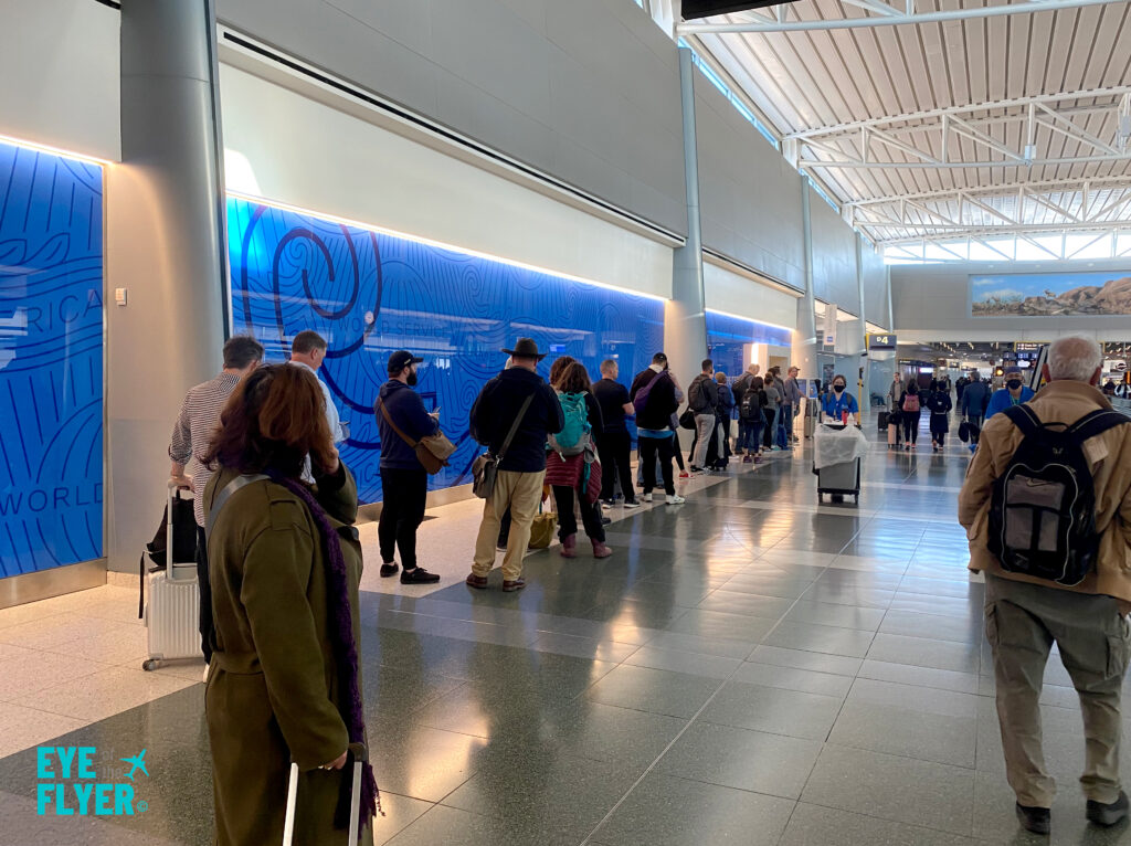 Travelers wait to get inside the American Centurion Lounge at Henry Reid Las Vegas International Airport (LAS).