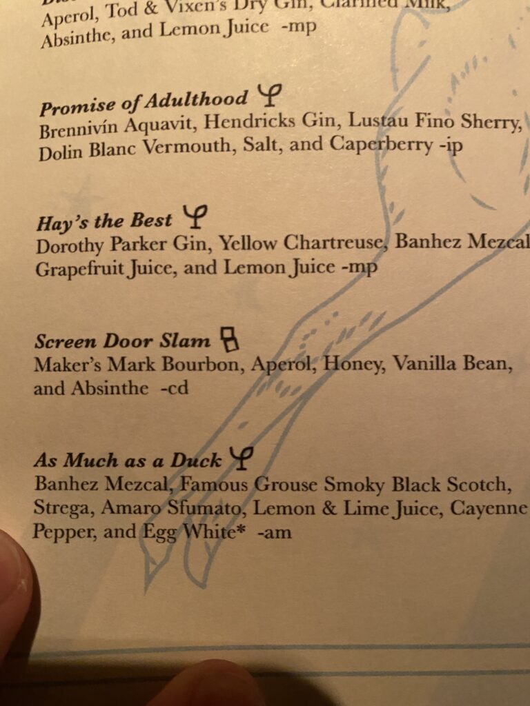 a menu with writing on it