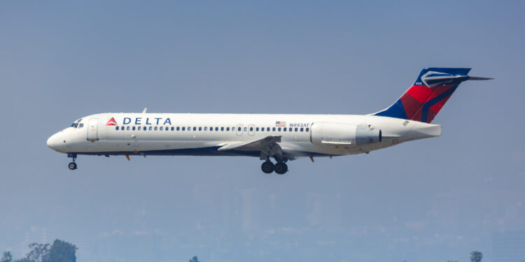 Los Angeles, California – April 14, 2019: Delta Air Lines Boeing 717-200 airplane at Los Angeles International airport (LAX) in California. Boeing is an American aircraft manufacturer headquartered in Chicago. (©iStock.com/Boarding1Now)
