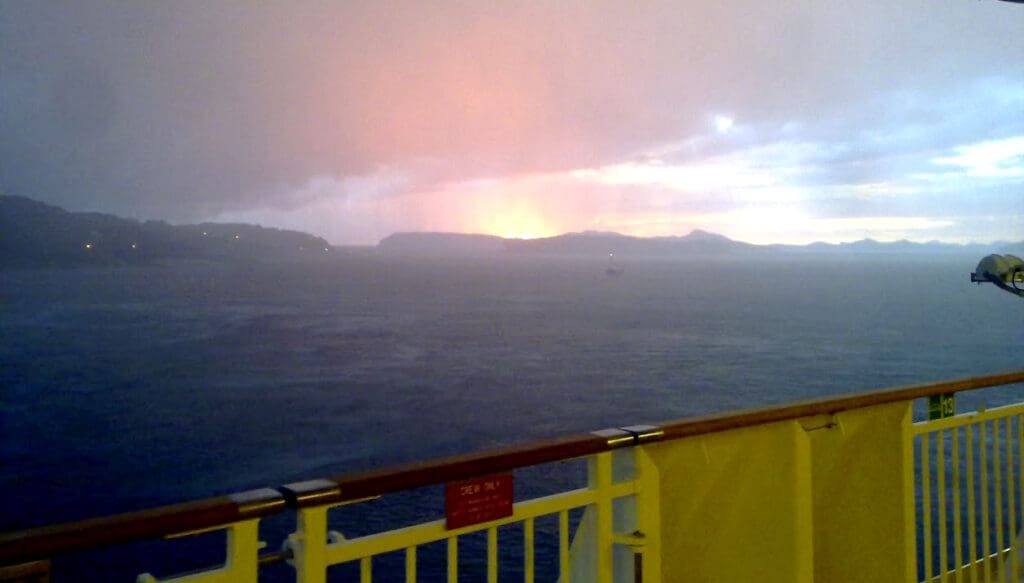 a view of the ocean from a deck of a ship